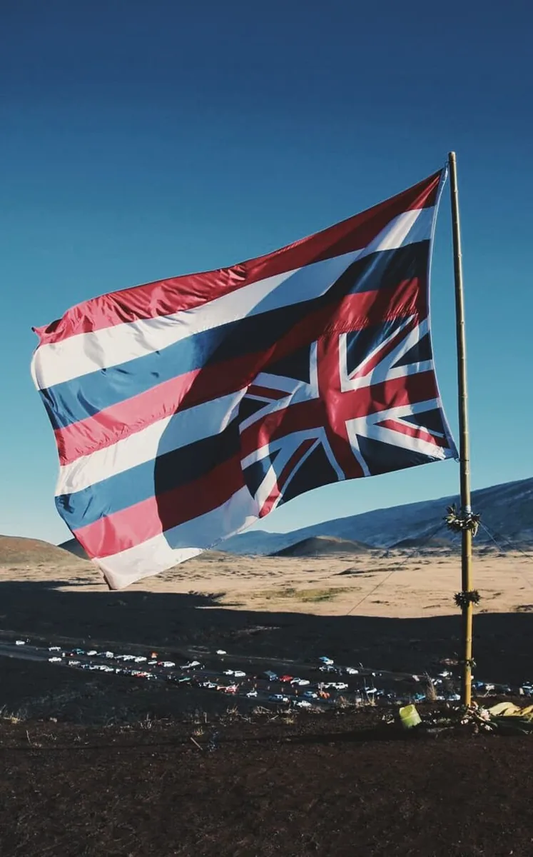 Hawaiian flag flying at Maunakea